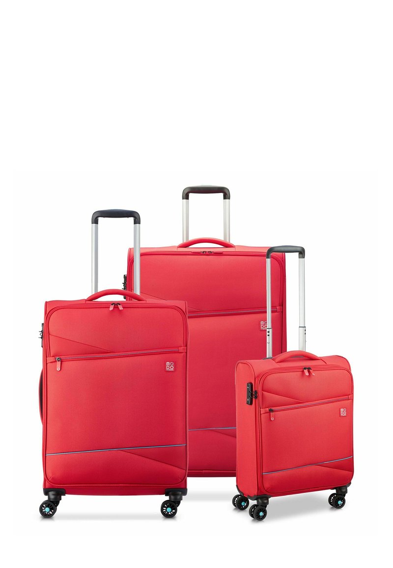 Three red suitcases with aluminum handles and four wheels each. Textured fabric, varying sizes, featuring front zip pockets and carry handles.