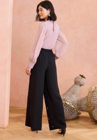 Love & Roses HAND EMBELLISHED WIDE LEG - Hlače - black