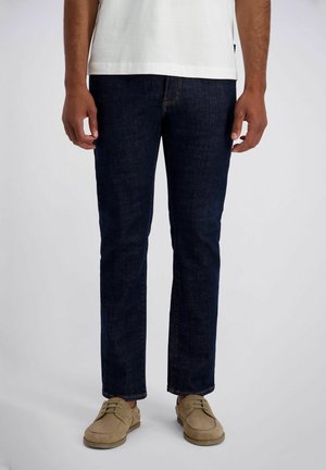 - Jeansy Slim Fit