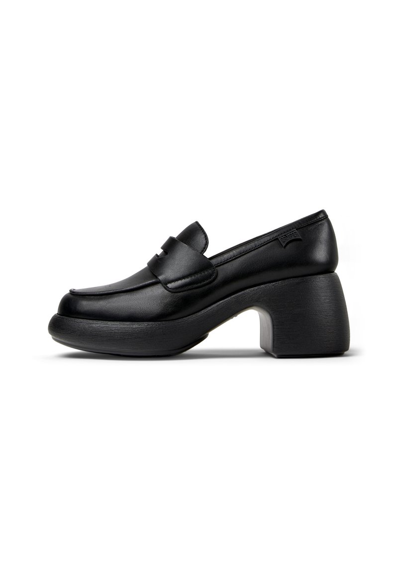 Black leather loafers with a rounded toe and a structured, chunky heel. Features a strap across the vamp for added detail.