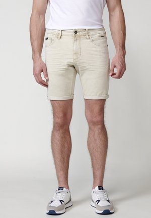 Denimové šortky - beige