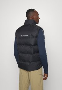 Helly Hansen ACTIVE PUFFY - Strukirani kaput - black
