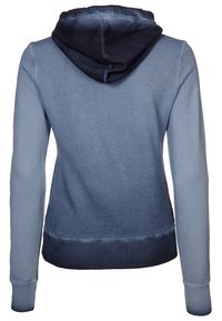 Huvtröja med en ombre-design som övergår från mörk marinblå till ljusblå. Tillverkad av mjukt tyg med ribbade manschetter och nederkant.