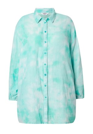 Kevyt, pitkähihainen, nappilistalla varustettu paita teal-värisessä käänteessä. Sisältää klassisen kauluksen ja turkoosit napit edessä.