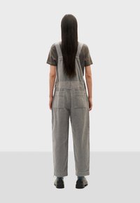 Thinking Mu LUZ - Latzhose - light grey