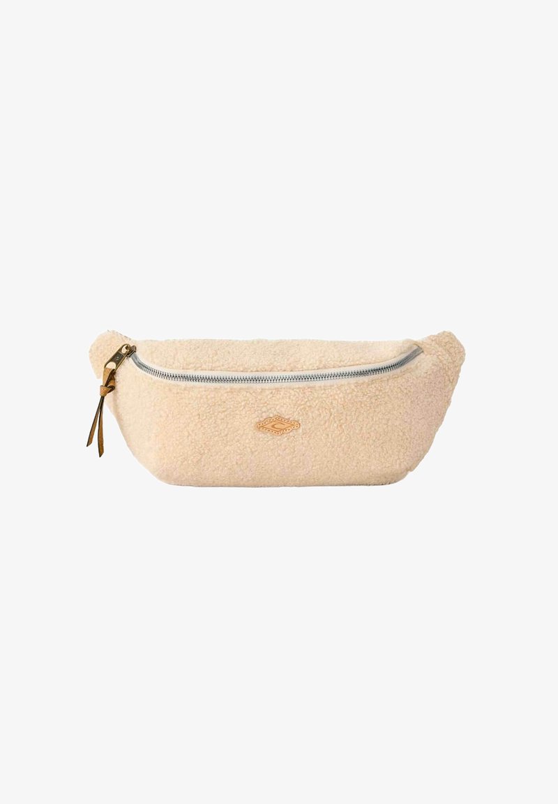 Sacoche en polaire beige avec une fermeture éclair lisse, un accent en cuir et des bords arrondis pour un design compact et doux.