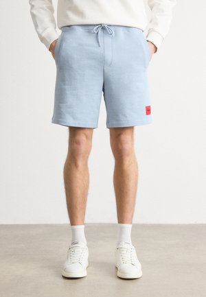 HUGO DIZ - Tracksuit bottoms - open blue
