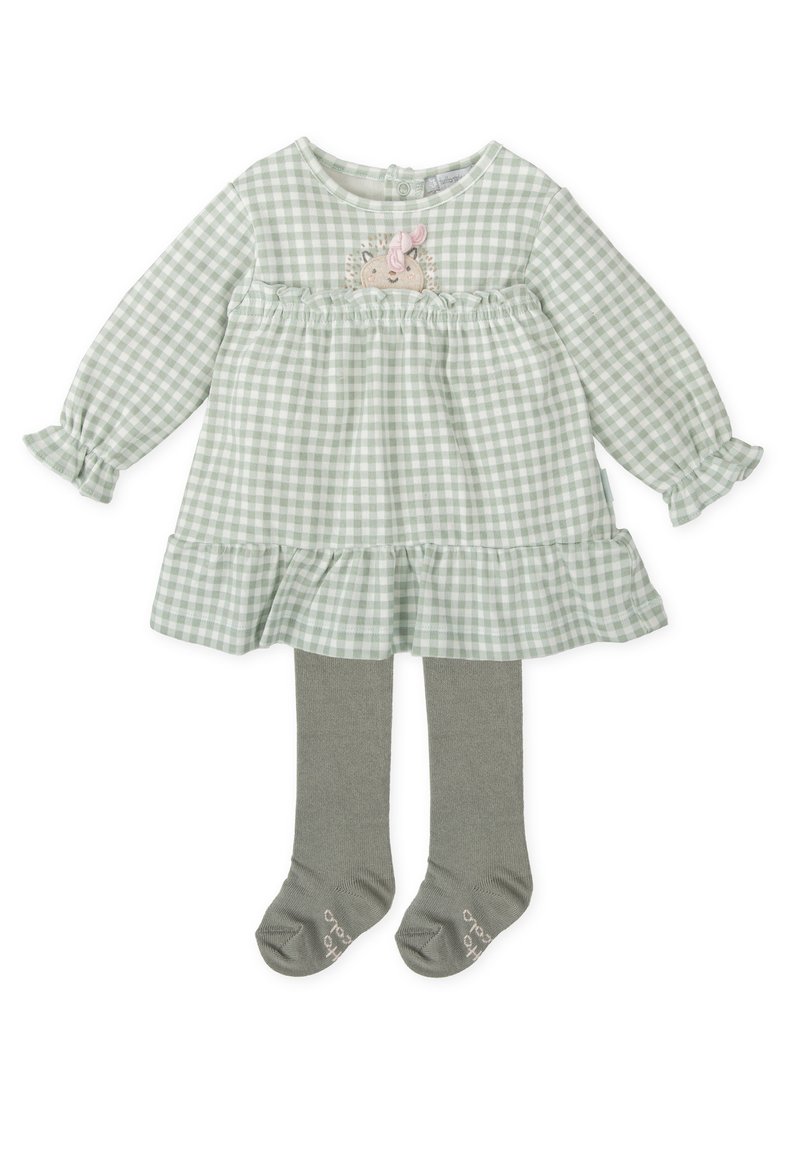 Vestido a cuadros verde y blanco con mangas largas, detalles de volantes, estampado de erizo, combinado con medias grises y calcetines a juego.