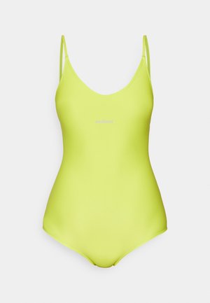 Neon gul svømmedragt med tynde skulderstropper, scoop-neck og glat tekstur; logo trykt i midten. Enkel, minimalistisk design.