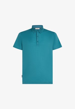 Polo shirt verde acqua a maniche corte realizzato in tessuto testurizzato. Caratterizzato da un colletto classico, tre bottoni e un orlo dritto. Etichetta visibile di lato.