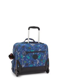 Blue rolling suitcase with marine-themed patterns, black accents, retractable handle, and attached monkey keychain. Textured fabric.