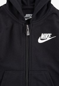 Nike Sportswear BABY COVERALL UNISEX - Macacão - black