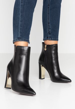 Stivaletti con tacco - black