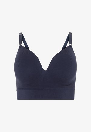 Reggiseno blu navy senza cuciture con coppe sagomate, spalline regolabili e fascia sottoseno larga per supporto e comfort.