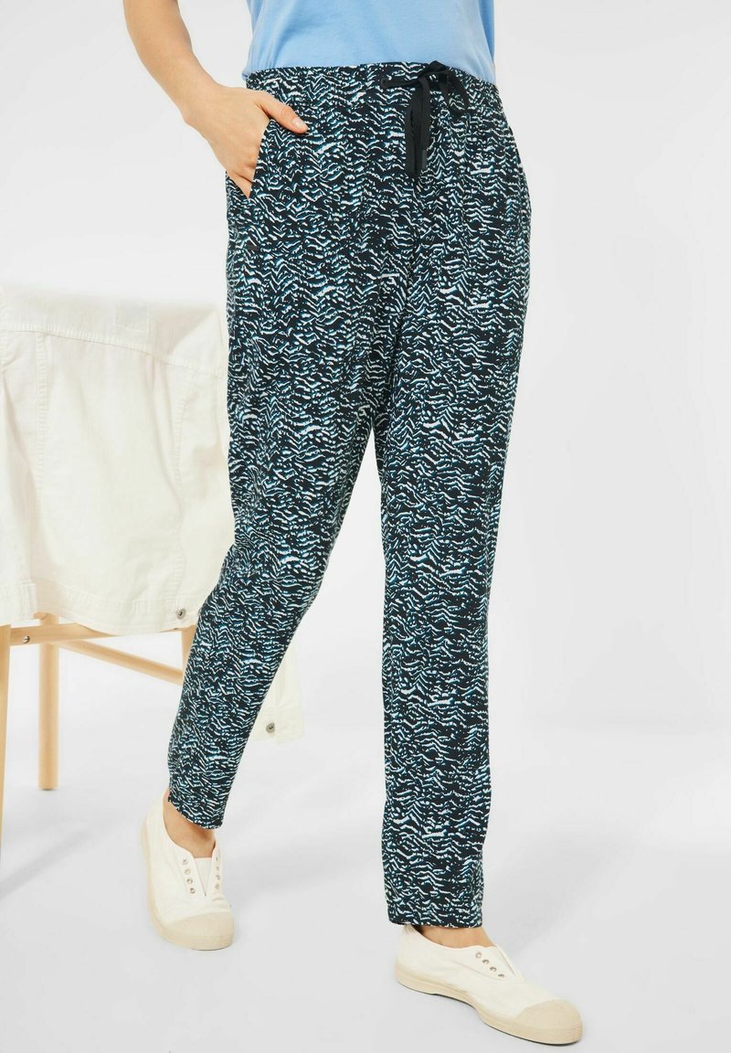Pantaloni jogger blu e neri con motivo, dotati di un elastico in vita e cordoncino, caratterizzati da tasche frontali e una vestibilità comoda.