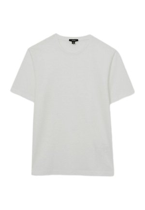Witte T-shirt met korte mouwen van zachte, geribbelde stof. Heeft een klassieke ronde halslijn en een losse pasvorm met een rechte onderkant.