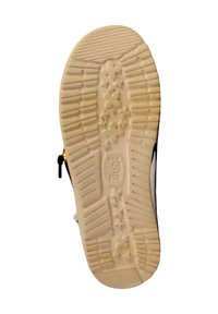 Semelle de chaussure en caoutchouc avec une surface texturée couleur crème, présentant des rainures horizontales et verticales, ainsi qu'un motif en forme d'étoile pour une meilleure adhérence.