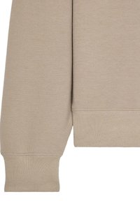 Lyse beige sweatshirtærme med ribbede manchetter, blødt bomuldsstof, flade sømme og en afslappet pasform.
