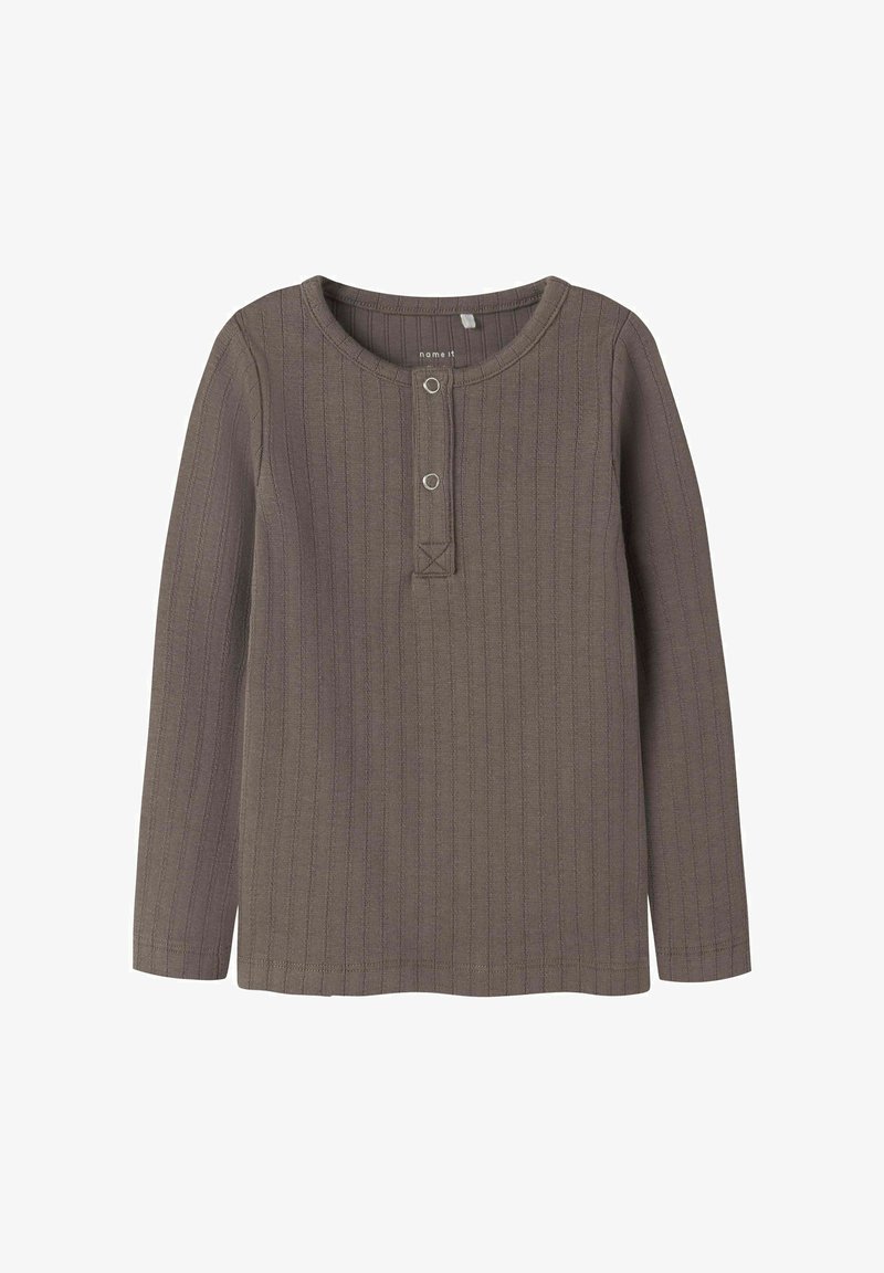 Bruine langemouwen ribstof shirt met een ronde halslijn, knoopsluiting en een kleine horizontale stiksel detail aan de onderkant.