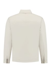 Lichtbeige overhemd met lange mouwen, een gestructureerde kraag, knoopmanchetten en een gladde, zachte textuur. Heeft een eenvoudige achterkant.