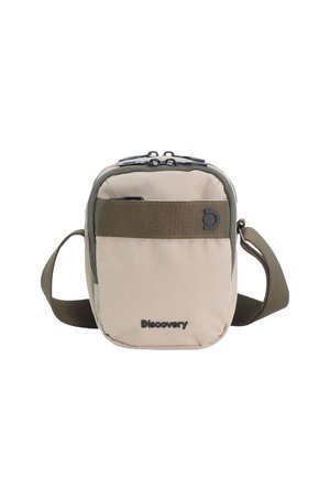 Compact beige and olive crossbody bag with adjustable strap, front zipper pocket, and "Discovery" logo on front panel.