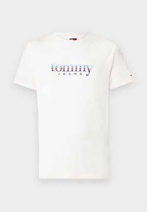 Fehér, rövid ujjú, környakú póló, középen multicolor "tommy JEANS" logóval a mellkason és kicsi flag logóval a bal ujján.