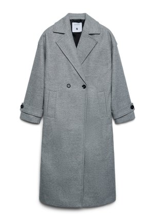 Szary wełniany płaszcz o podwójnym zapięciu, z klapami w szpic i zawiniętymi rękawami. Posiada dwie boczne kieszenie oraz czarne guziki.