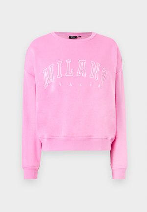 Roza dukserica izrađena od mekanog materijala s okruglim izrezom i spuštenim ramenima. Ispis "MILANO ITALIA" u bijeloj boji na prednjoj strani.