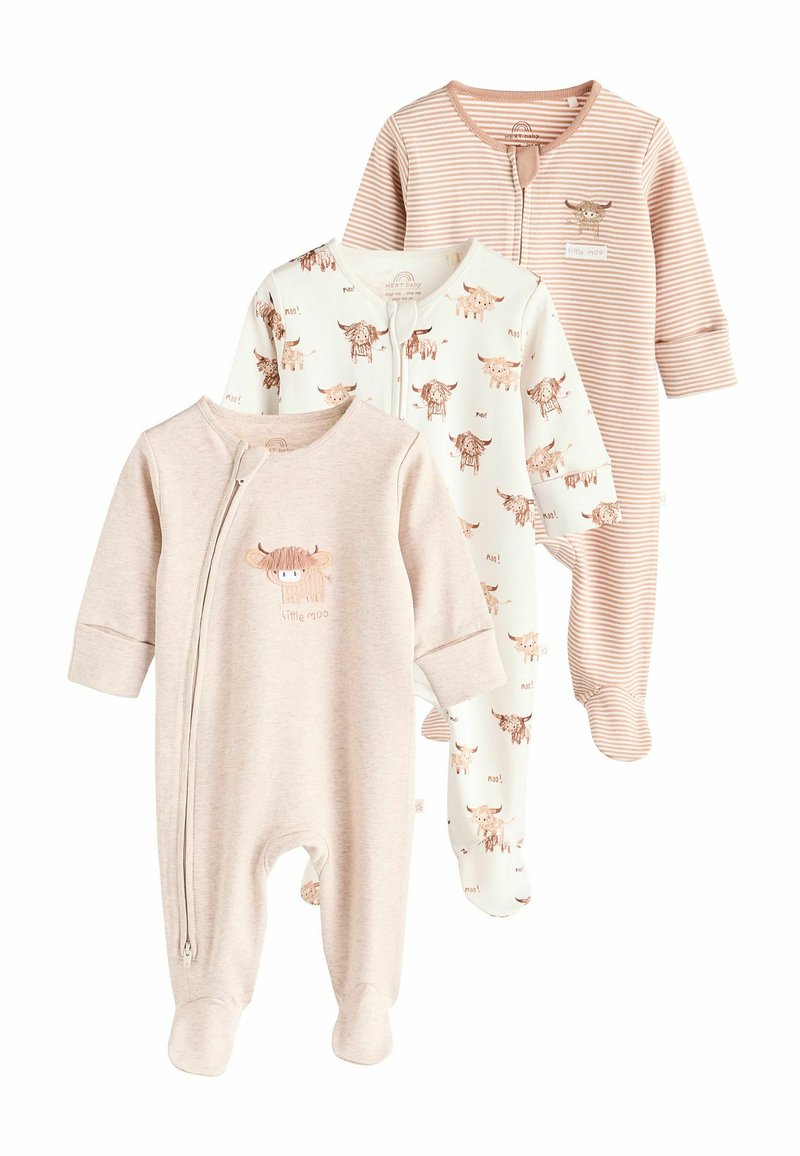 Tre body da neonato: uno beige uniforme con una grafica di mucca, uno bianco con stampe di mucche, uno a righe beige e crema. Materiale in cotone morbido.
