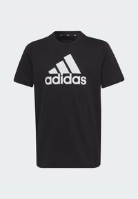 T-shirt nera in cotone con un grande logo bianco Adidas e scollo rotondo. Maniche corte con vestibilità normale. Texture liscia.