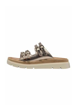Metallic bronze sandal med tre justerbare remme, med en tekstureret overdel og en tykk off-white sål. Flad fodsengdesign.