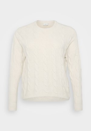 Pull en tricot blanc à col rond, à manches longues et avec des bords côtelés. La texture présente des motifs surélevés et entrelacés.