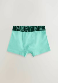 Boxer en vert menthe fabriqués en tissu doux avec une ceinture élastique verte foncée arborant le texte « NEXT » en lettres majuscules.