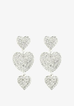 Silver-tone heart-shaped earrings with three tiered hearts, adorned with clear rhinestones, featuring a polished finish and smooth texture.