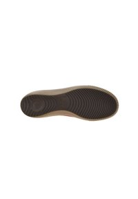 Shoe sole in brown rubber with textured grip patterns and "Legero" brand name embossed near the arch area.