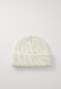 Off-white ribbed knit beanie with folded cuff, displayed flat on a white background.