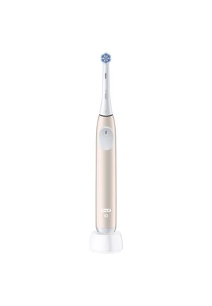 Brosse à dents électrique avec tête de brosse ronde bleue et blanche, manche beige et base de chargement sur fond blanc.