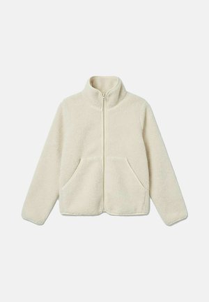 Veste en polaire couleur crème avec fermeture éclair complète à l'avant, col montant, manches longues et deux poches avant, posée à plat sur un fond blanc.