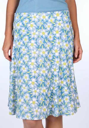 Röcke mit Blumenmuster, die einen blauen Hintergrund mit weißen Gänseblümchen und grünen Blättern zeigen. Hergestellt aus leichtem Stoff mit ausgezogener Passform.