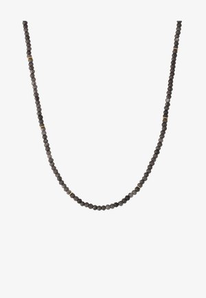 Juodas karoliukas su facetuotais brangakmeniais ir auksiniais akcentais, turintis lygų, vienodą virvės dizainą.