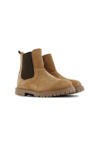 Bruine suède enkellaarzen met elastische zijpanelen, ronde neus en robuuste rubberen zool met groeven voor grip.