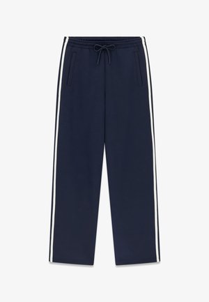 Guess, JOGGER MIT SEITENSTREIFEN - Trainingsbroek - blau
