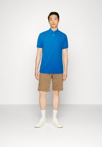 Tommy Hilfiger REGULAR - Polokošeľa - shocking blue