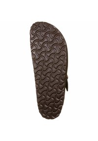 Suola in gomma marrone con motivo ondulato, dotata di scanalature texture per una migliore aderenza. Design piatto adatto per calzature casual.