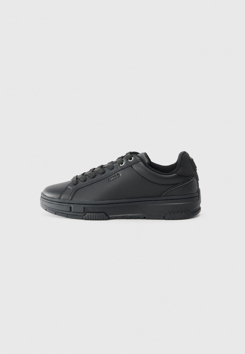 Black athletic sneakers with a smooth leather upper, rounded toe, lace-up front, and textured rubber sole; logo detail on the heel.