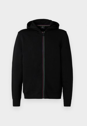Hoodie zippé noir en coton, avec une fermeture éclair à rayures colorées, des manches longues et une capuche. Texture lisse, sans motifs visibles.
