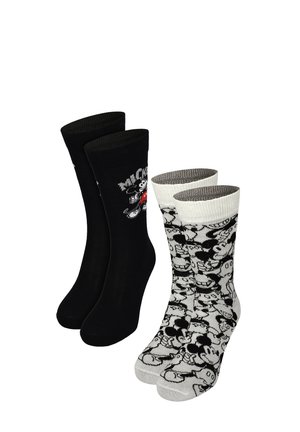 Two pairs of crew socks, one black with small Mickey Mouse graphic, one white with allover black and white Mickey Mouse pattern.