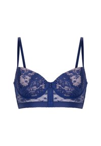 Spetstopp i djup marinblått med blommönster. Har en strukturerad kupa, justerbara band och en krokuppkoppling framtill.