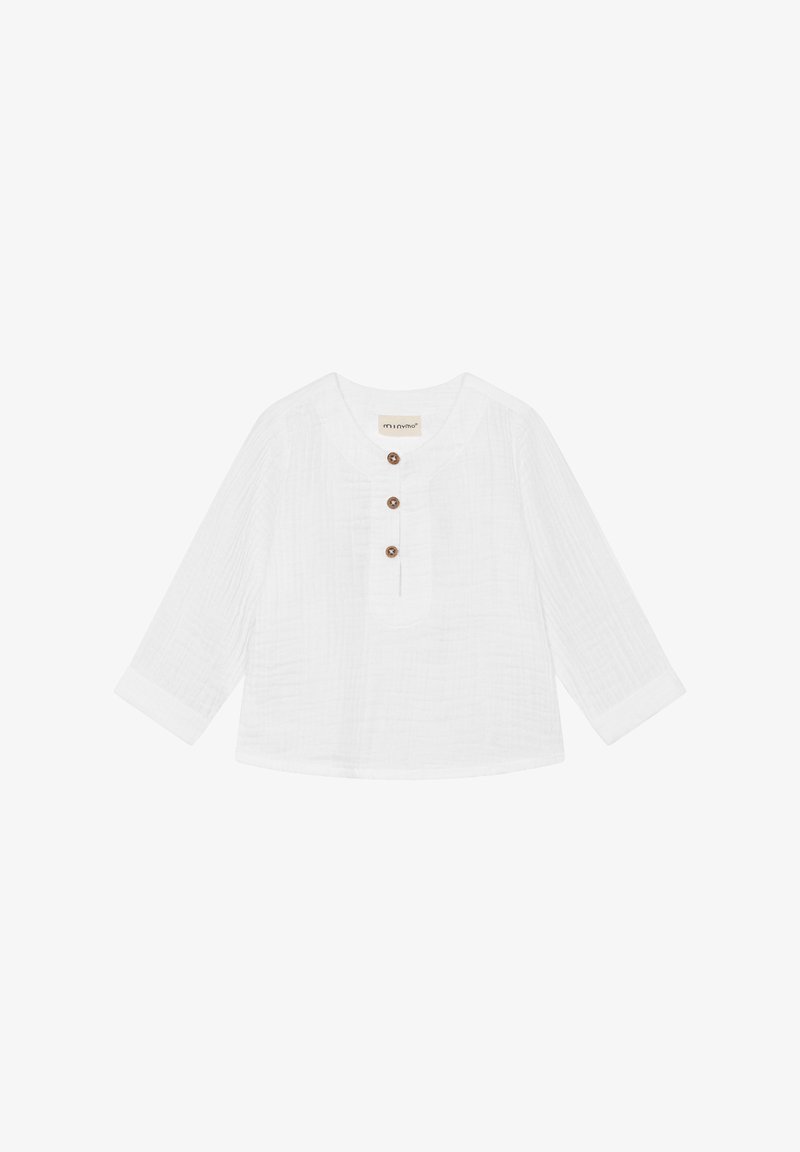 Biała bawełniana bluzka z długimi rękawami, okrągłym dekoltem i trzema drewnianymi guzikami z przodu. Materiał o fakturze z delikatnym wzorem marszczeń.