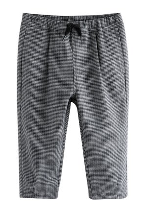 Zwart-witte houndstooth broek met trekkoord, elastische taille en rechte pijpen, plat weergegeven op een witte achtergrond.